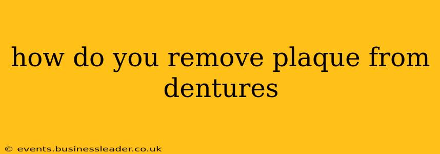 how do you remove plaque from dentures