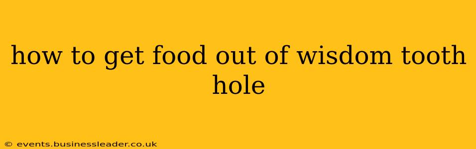 how to get food out of wisdom tooth hole