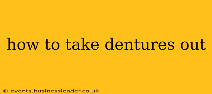 how to take dentures out