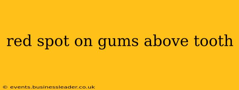 red spot on gums above tooth
