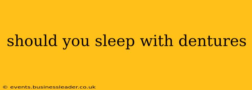 should you sleep with dentures