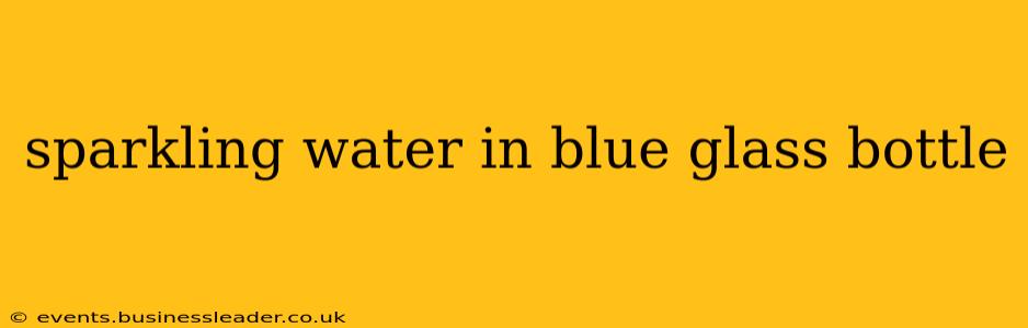 sparkling water in blue glass bottle