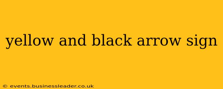 yellow and black arrow sign